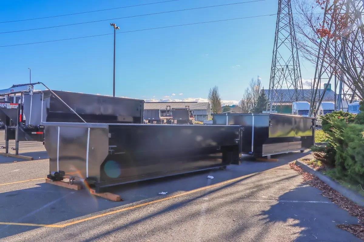 Roll-off dumpster ready for waste disposal at job site for 2 Yard Dumpster Rental in Geneseo
